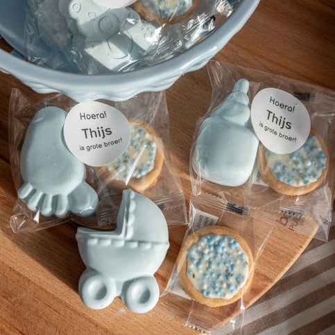 Gepersonaliseerde blauwe geboorte traktatie